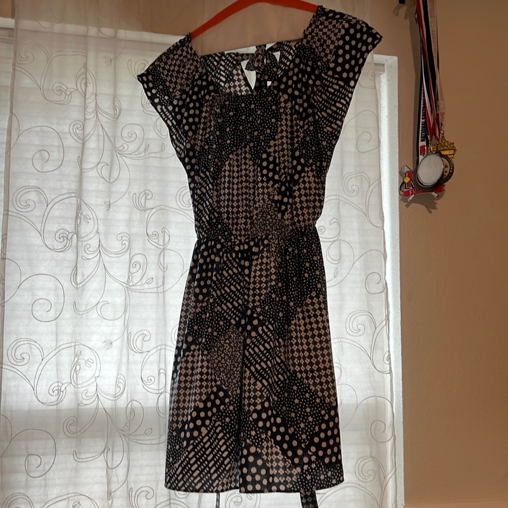A dress blue and white good condition brand is lauren Conrad